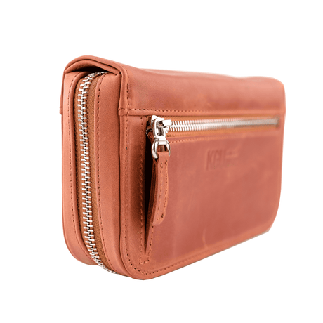 Stylish and compact mouthpiece pouch, designed for traveling musicians.