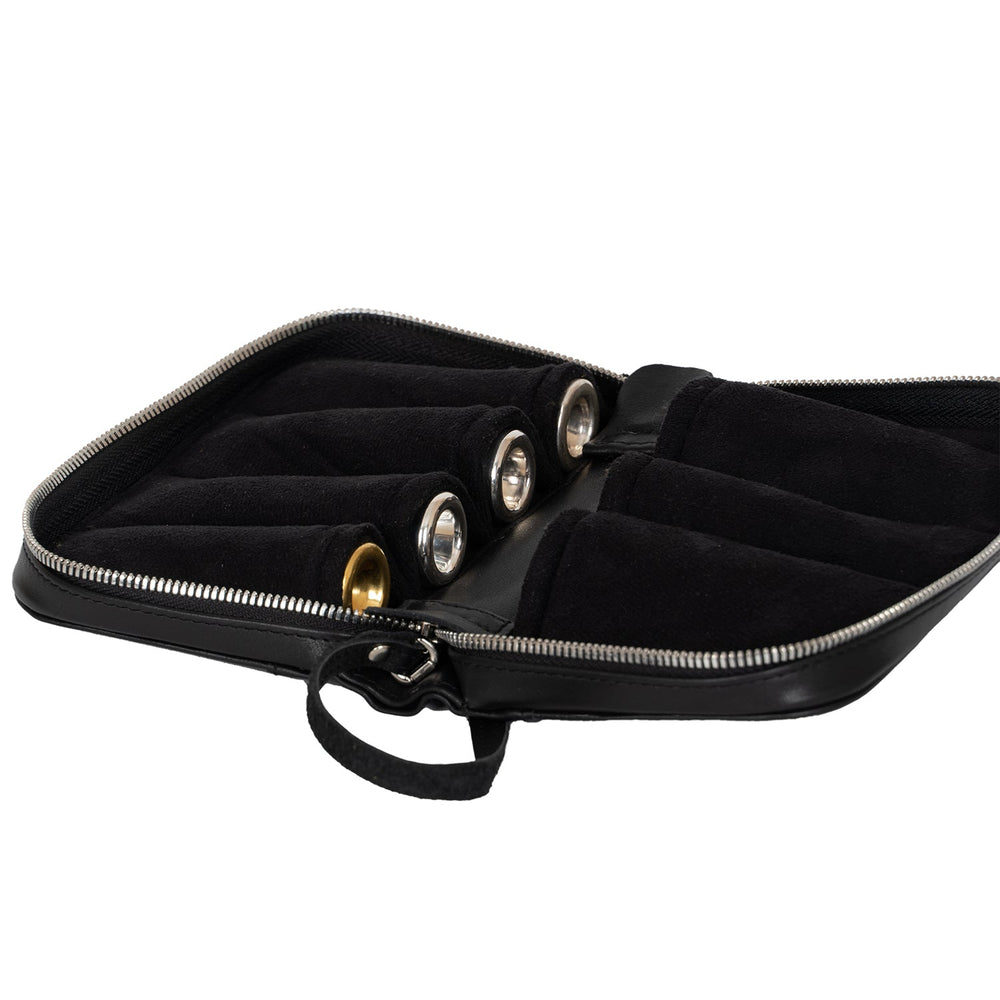 Trumpet leather holder for 4 or 7 trumpet mouthpieces. Detroit leather