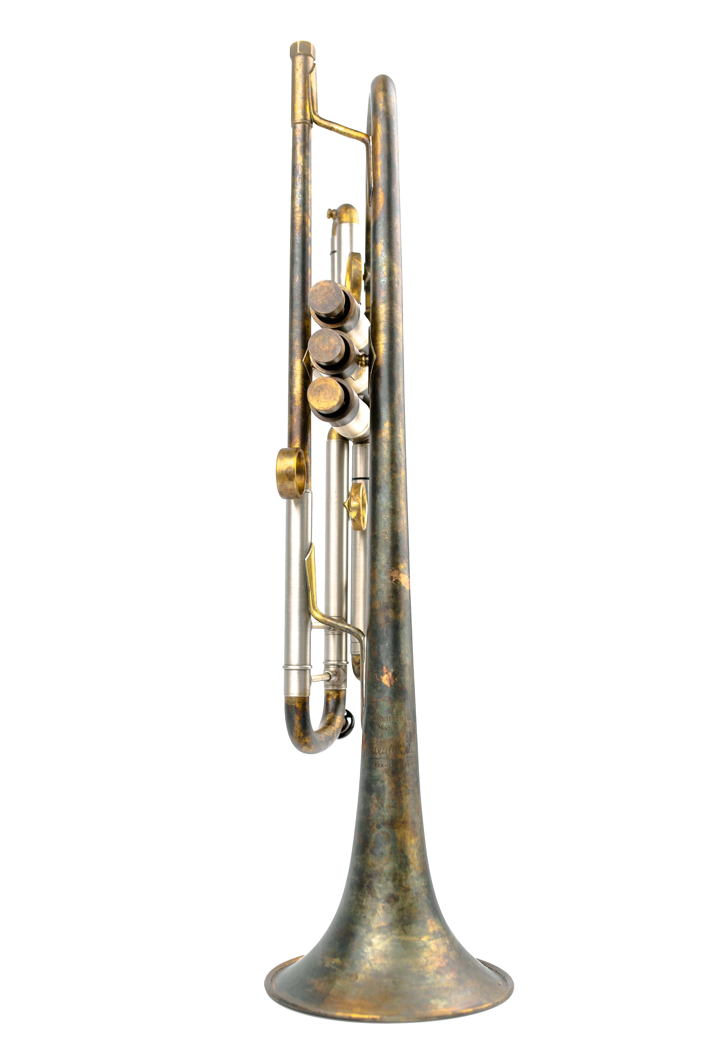 Top-down view of KGUmusic’s Bach Stradivarius 180-37 trumpet with distinctive military patina.