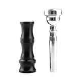 KGUmusic BuzzMaster and trumpet mouthpiece shown on white background.