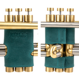 KGUmusic trumpet valve protectors, crafted from premium leather, isolated on white.