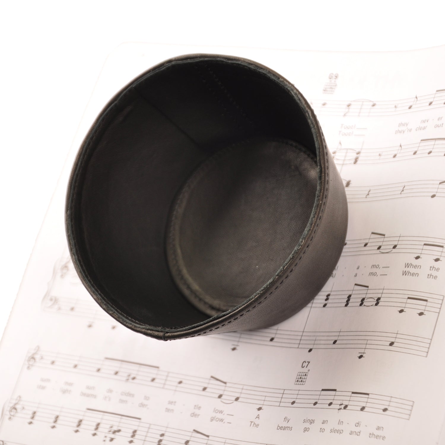 Leather plunger mute