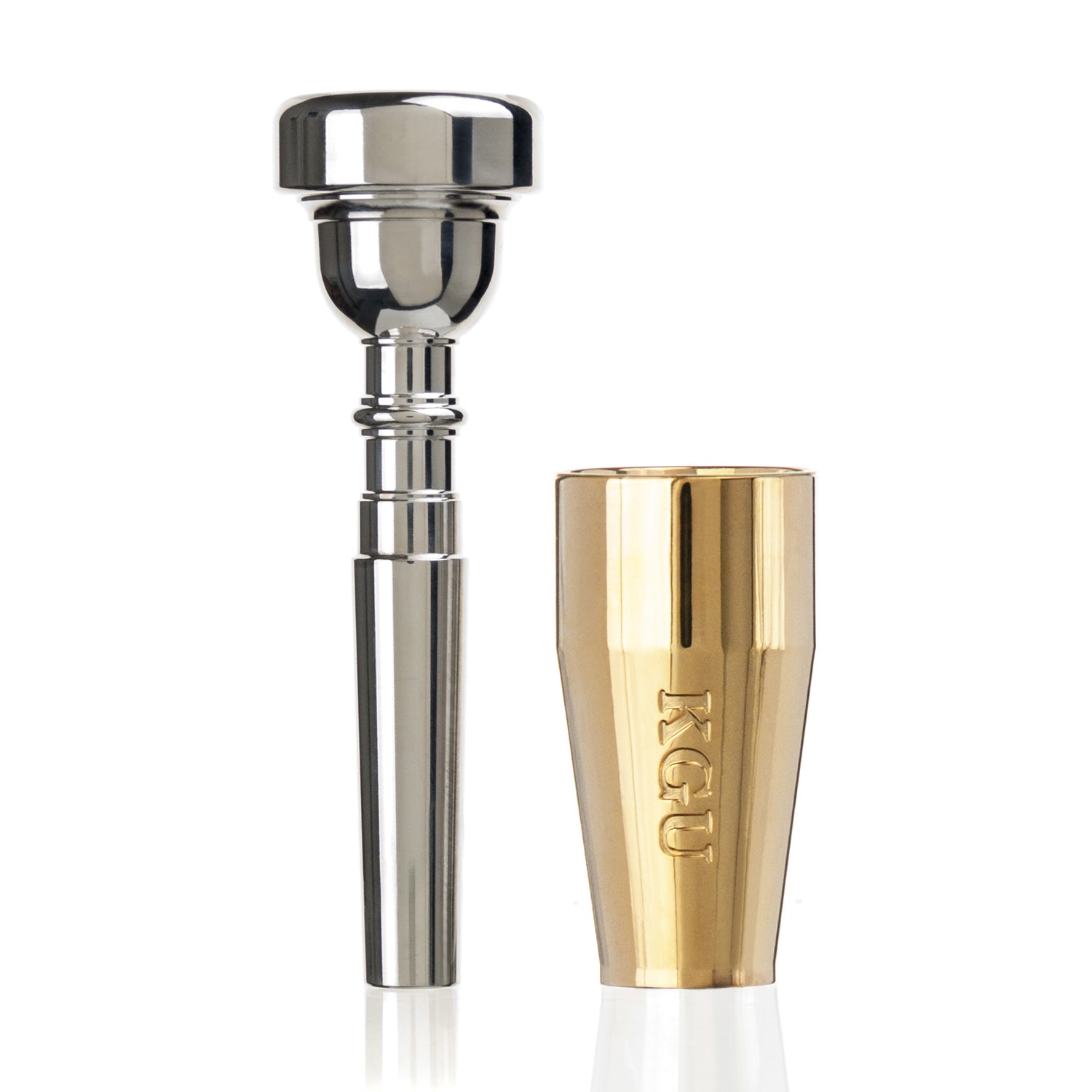 Trumpet mouthpiece and booster in 24K gold, stand on white background.