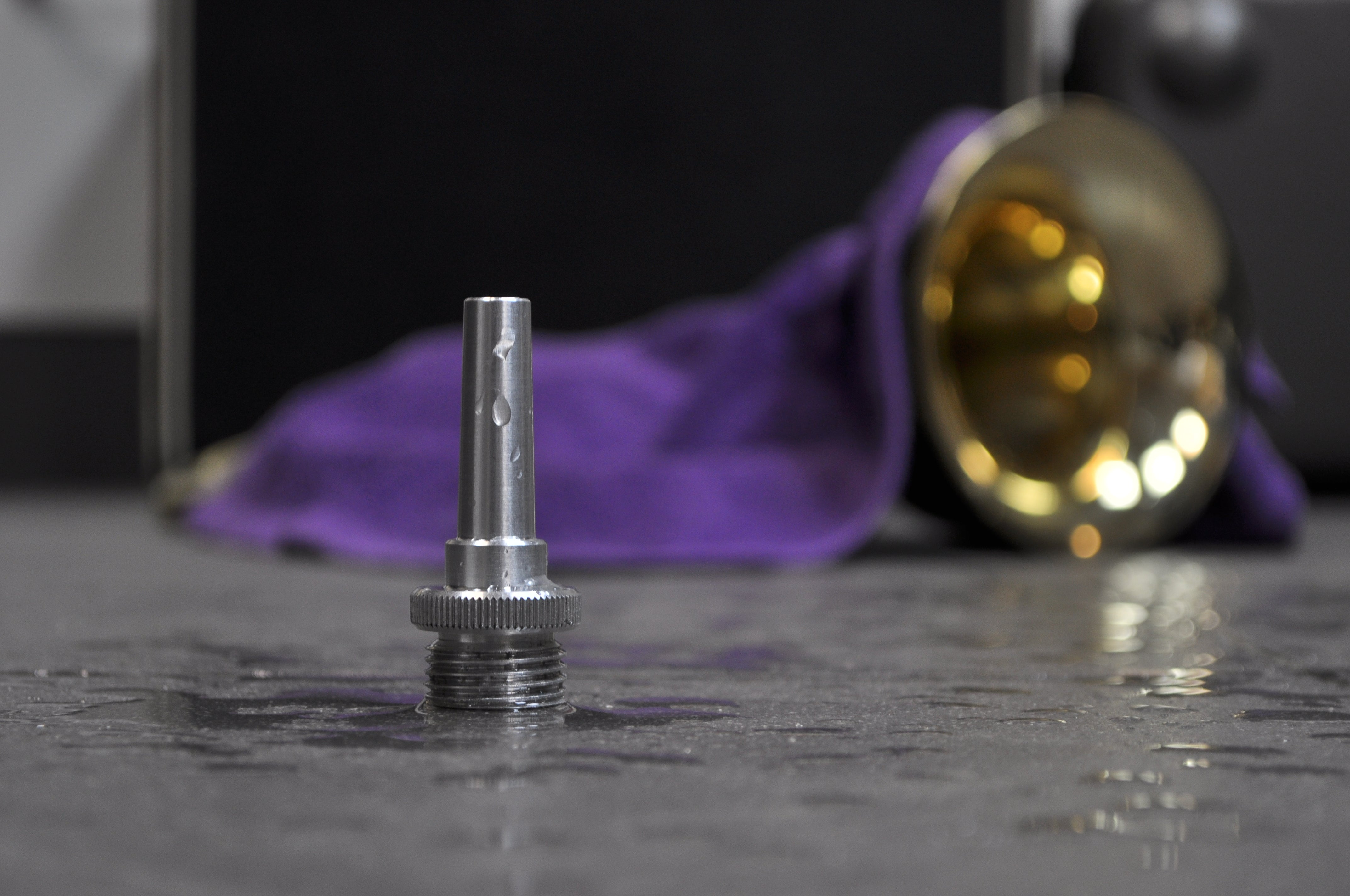 Cleaning Nozzle for trumpets and other brass musical instruments.