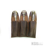 Triple trumpet mouthpieces pouches featuring stylish magnetic closures on white.