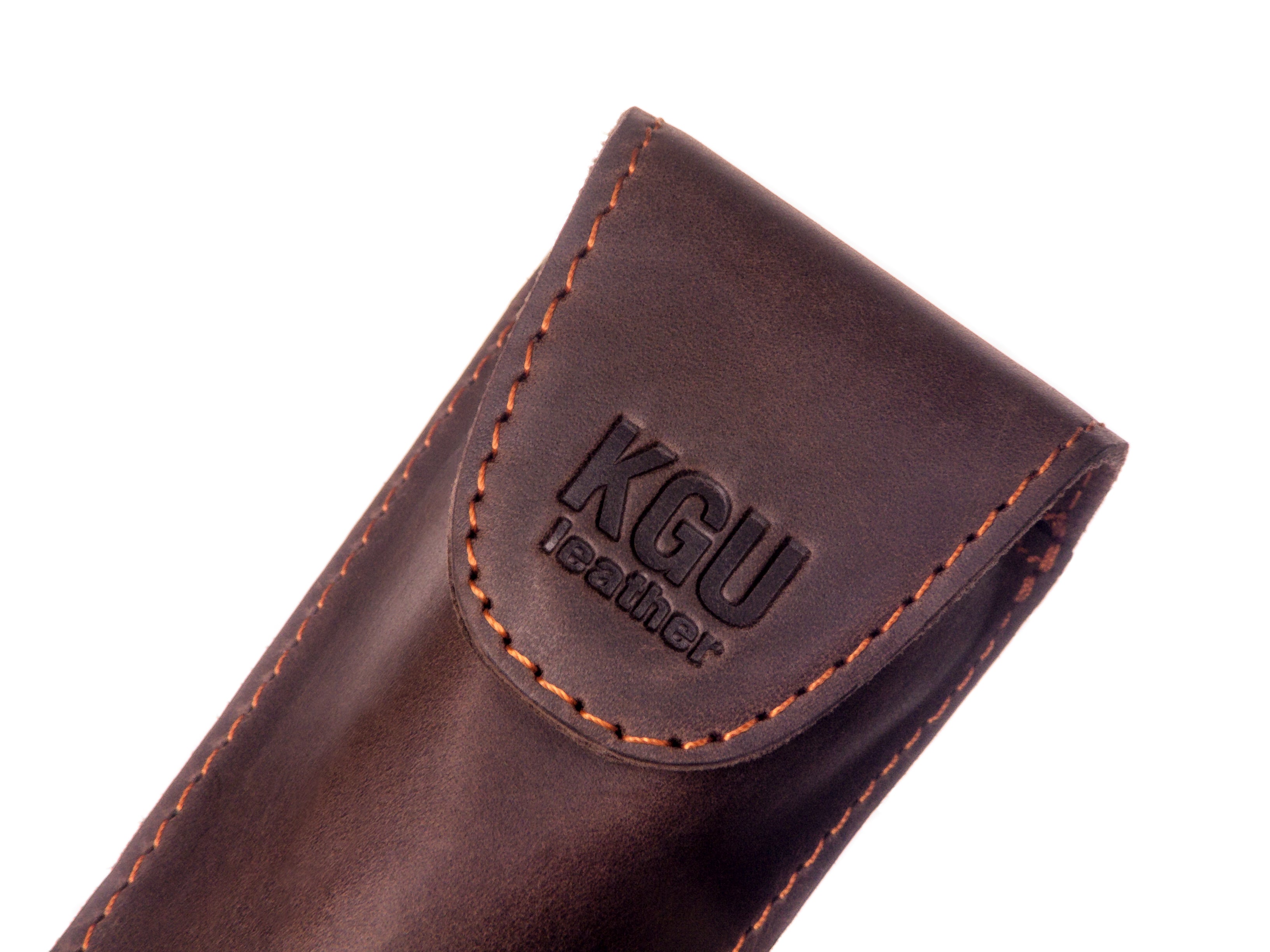 Close-up of single Leather trumpet mouthpiece pouch with magnetic snap.